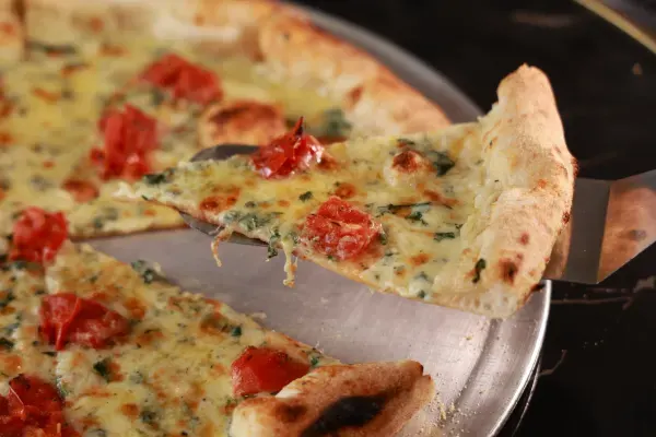 By the Slice at Oasis Pizzeria & Bakery, Davie – $3.79 on the menu