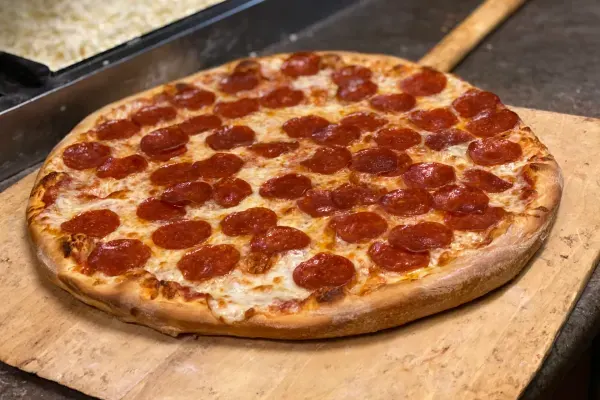 16" 1/2 & 1/2 Specialty Pizza at Peppino's Pizza, Gainesville – $1 on the menu