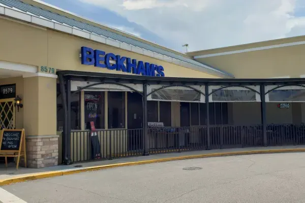 Grilled Baby Back Ribs** at Beckham's Sarasota Restaurant On The Trail, Sarasota – $27.99 on the menu